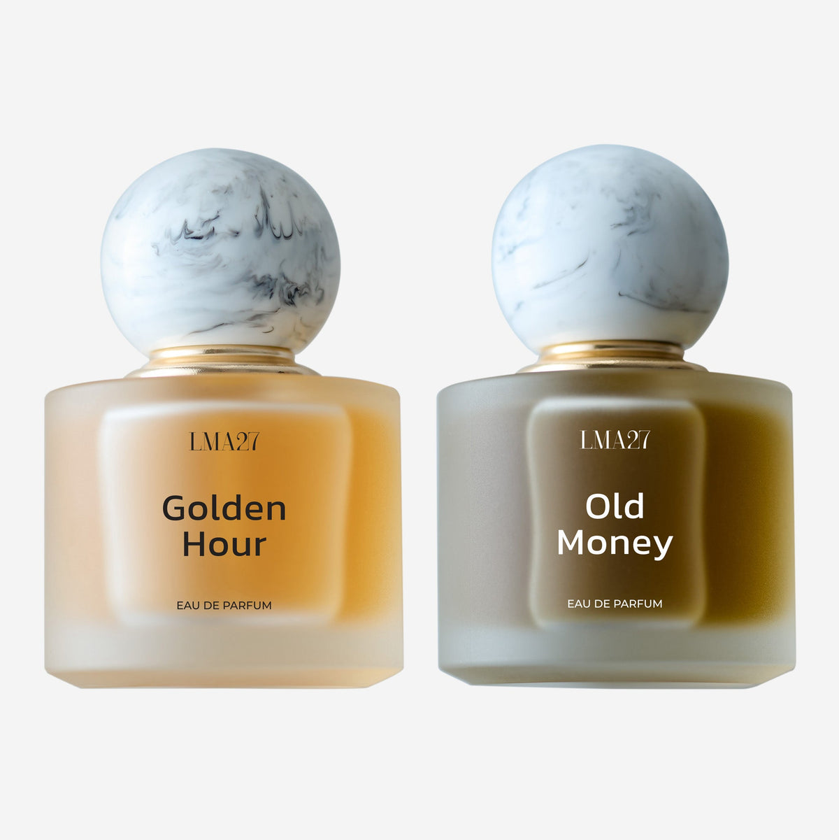 LMA27 Golden Hour and Old Money Eau de Parfum bundle featuring two luxury niche perfume bottles with marble caps, warm amber and deep woody tones